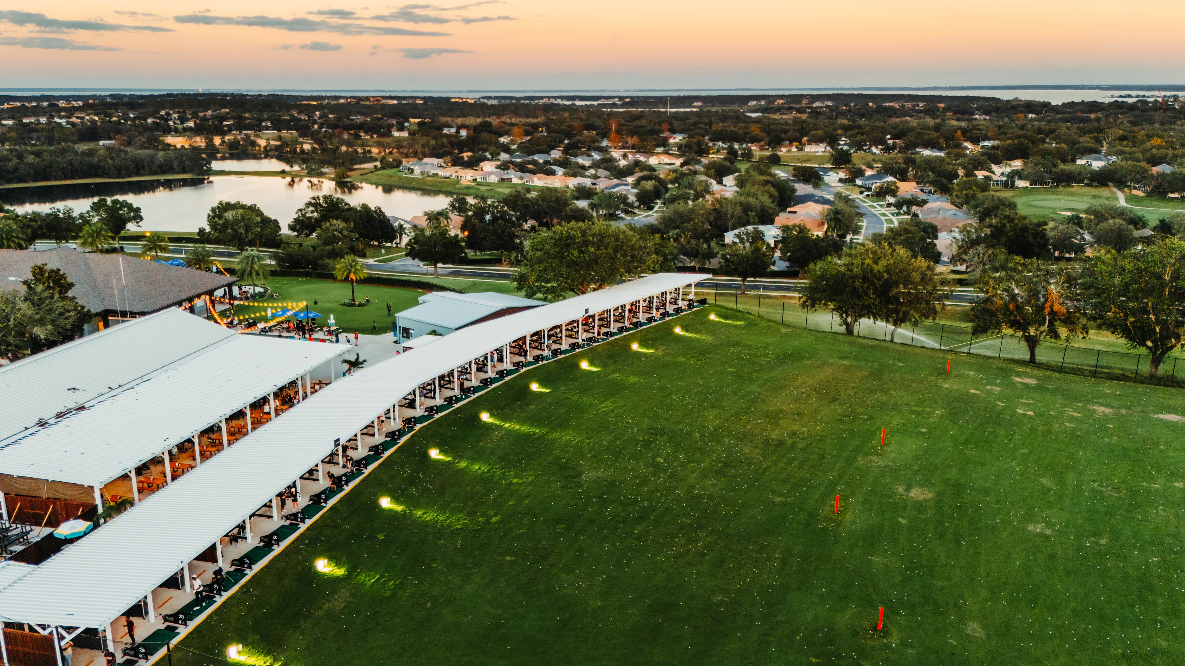 Sunset aerial over Clermont National with surrounding lake