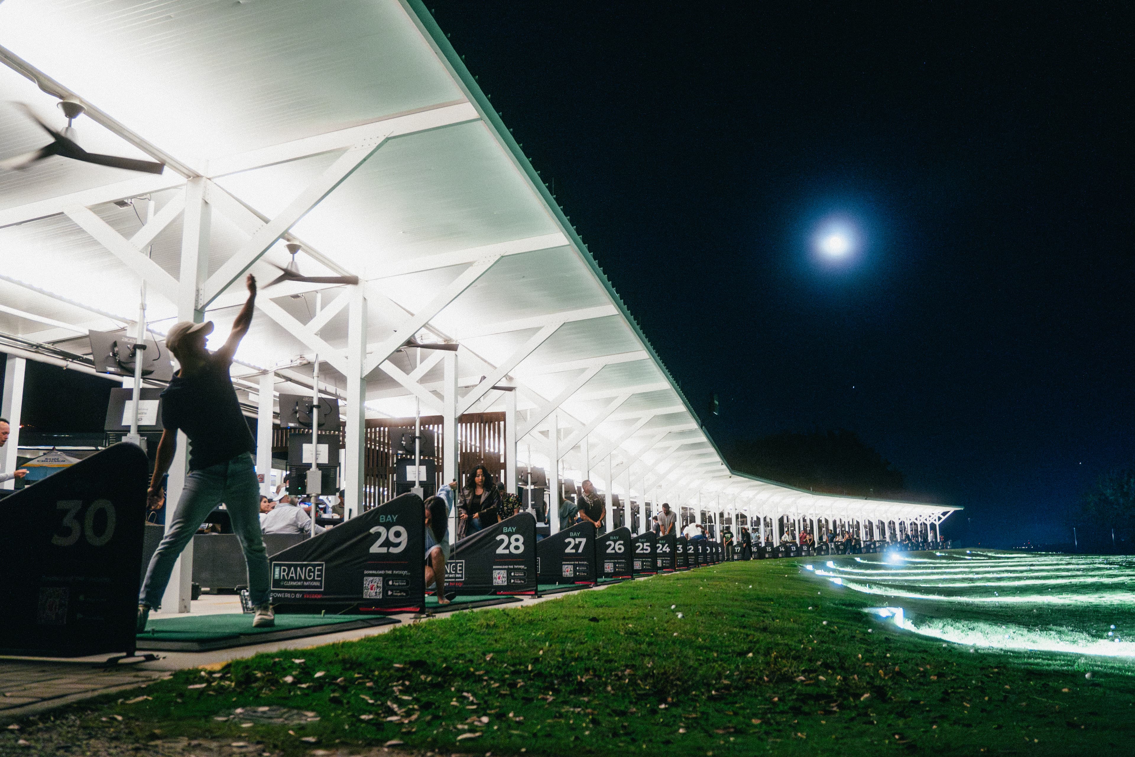 Panoramic view of the driving range at night